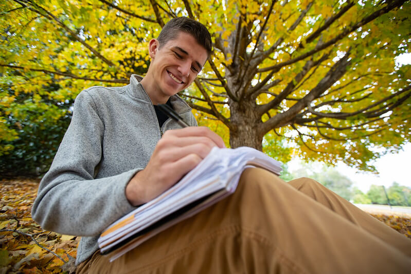 student stydying outside