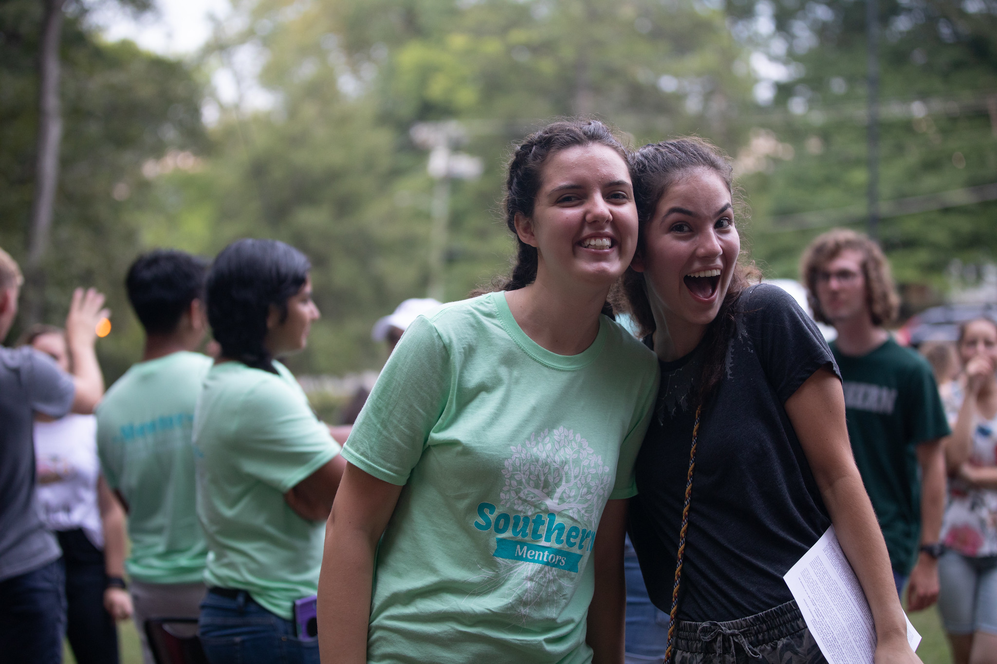 Two people smiling 