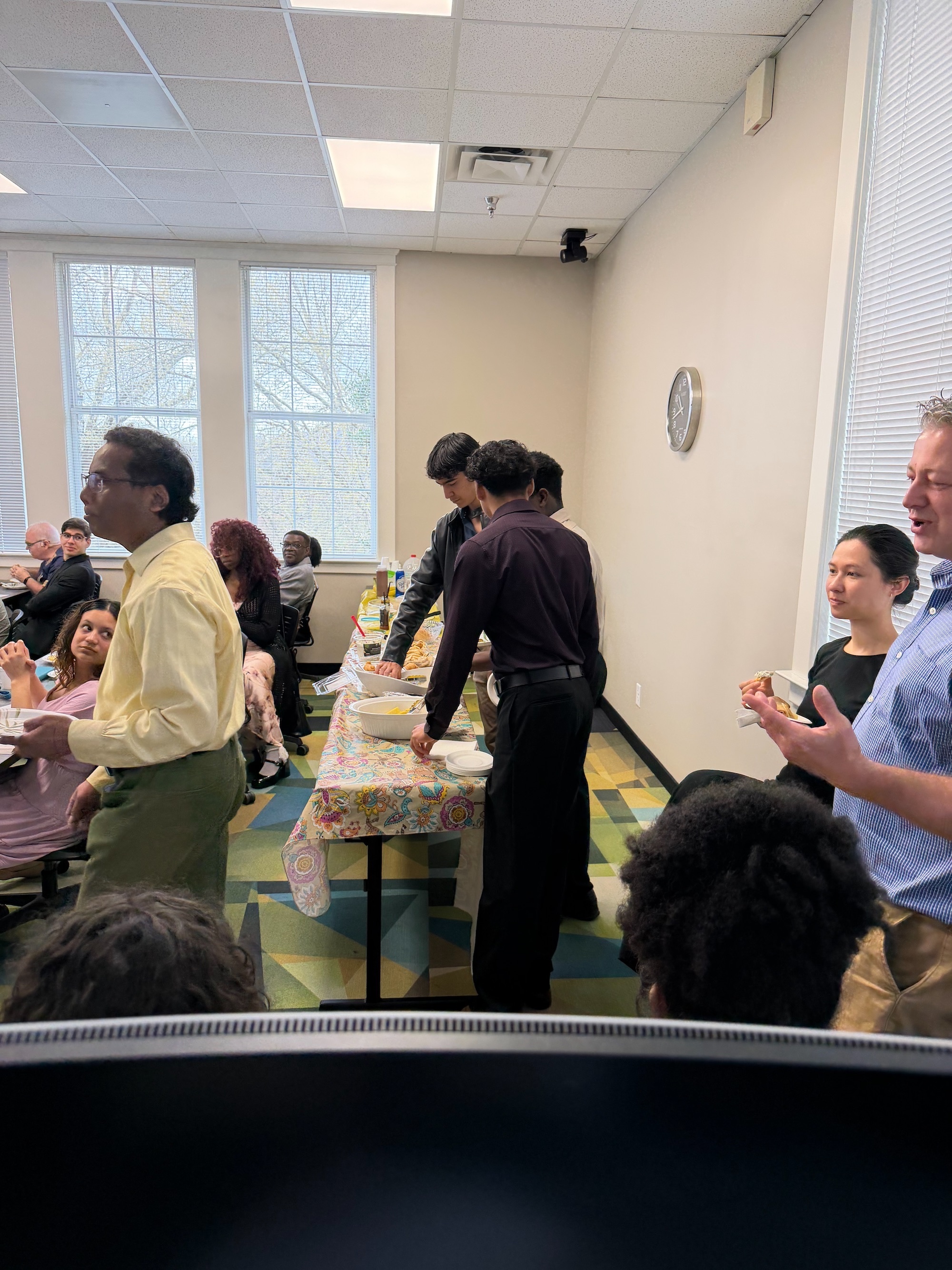 Group of people getting some good food.