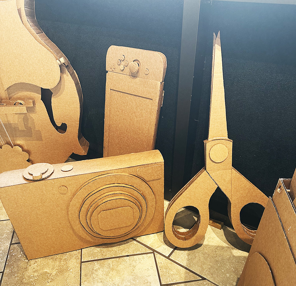 Cardboard objects made at varying scale 