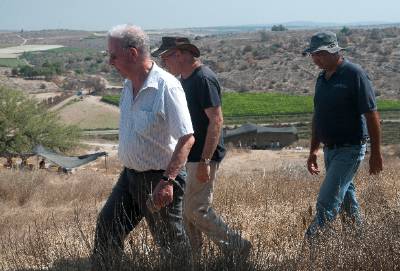 people walking in a field