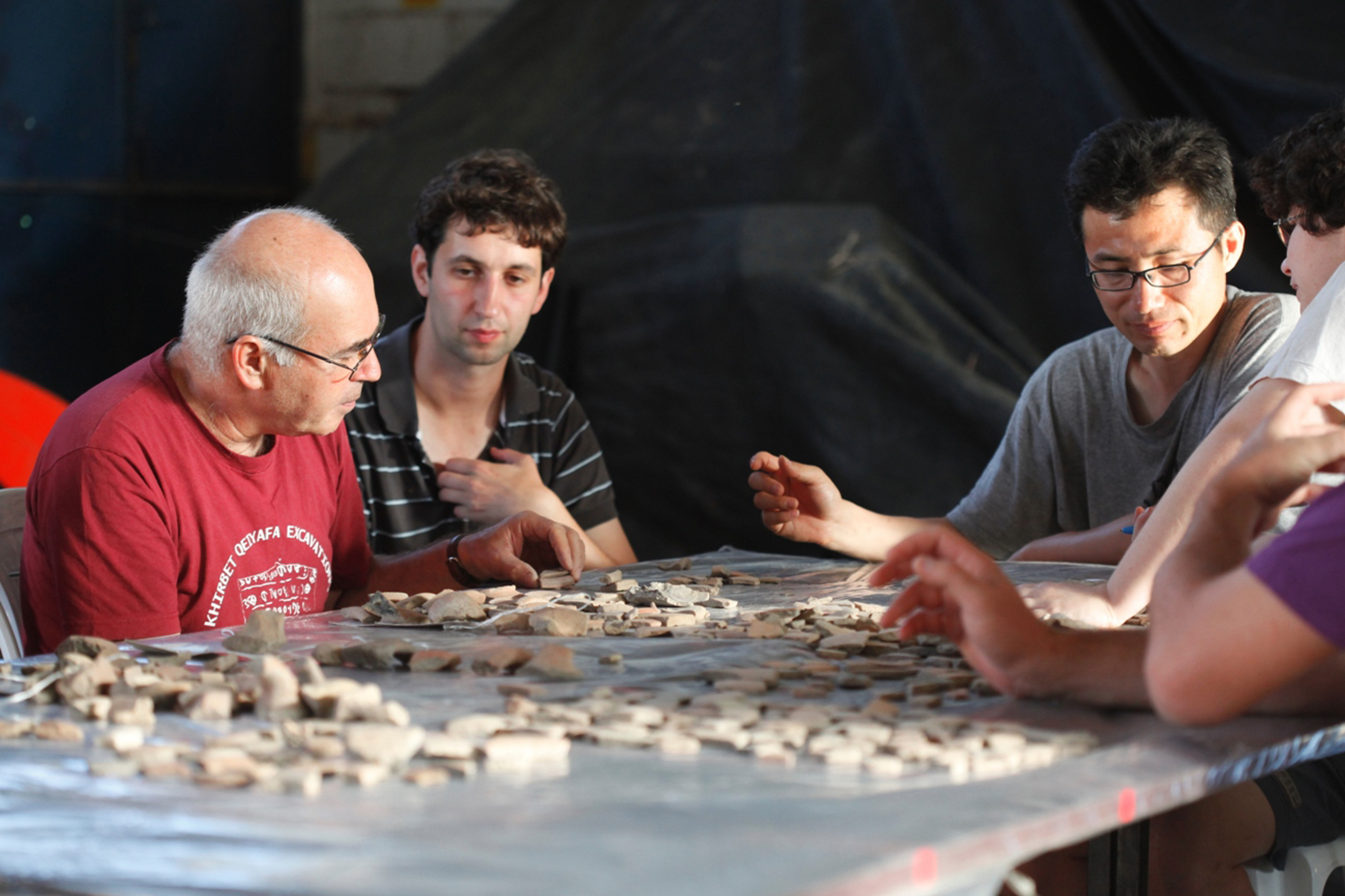 people observing rocks