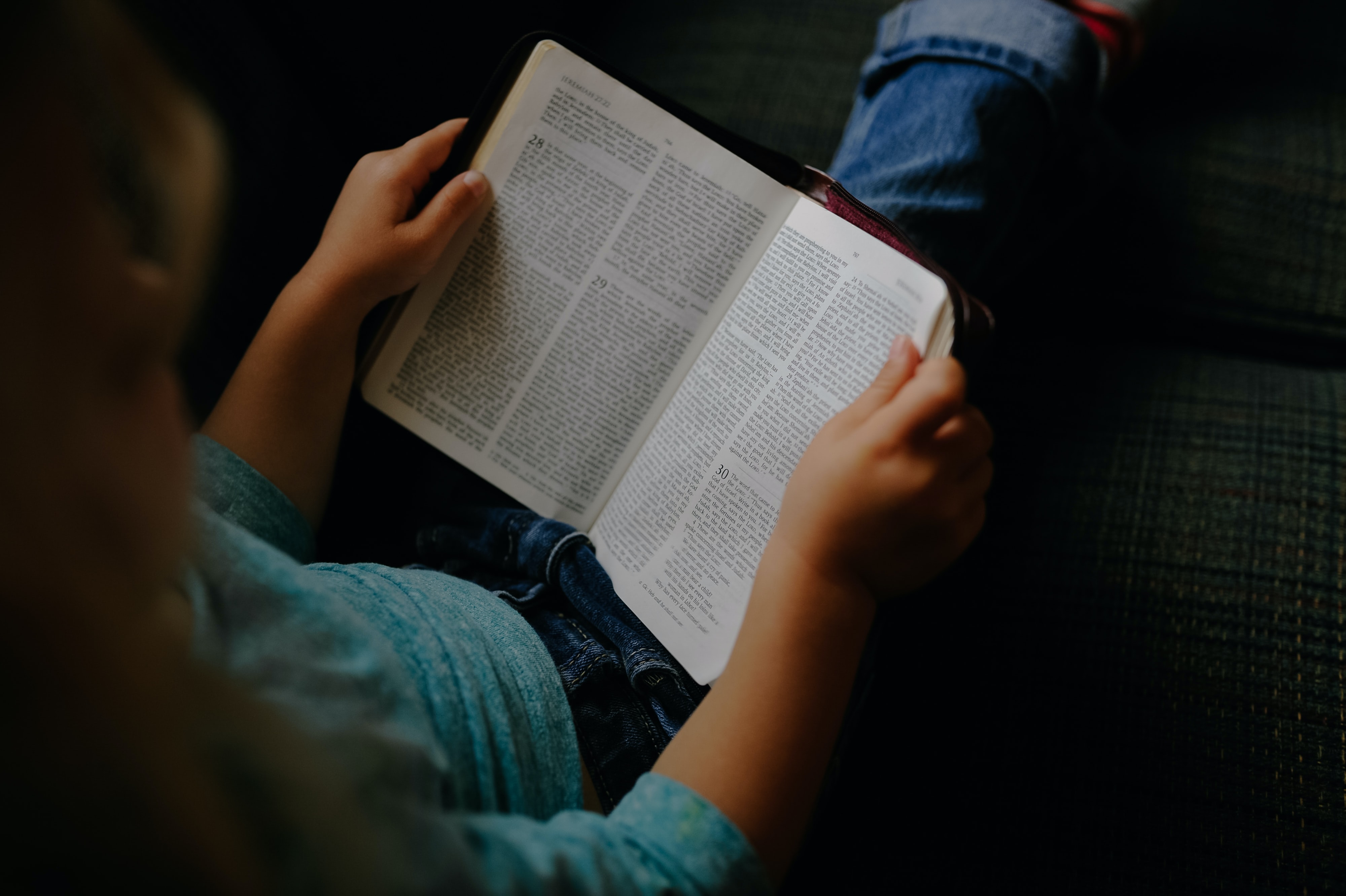 Student reading the Bible