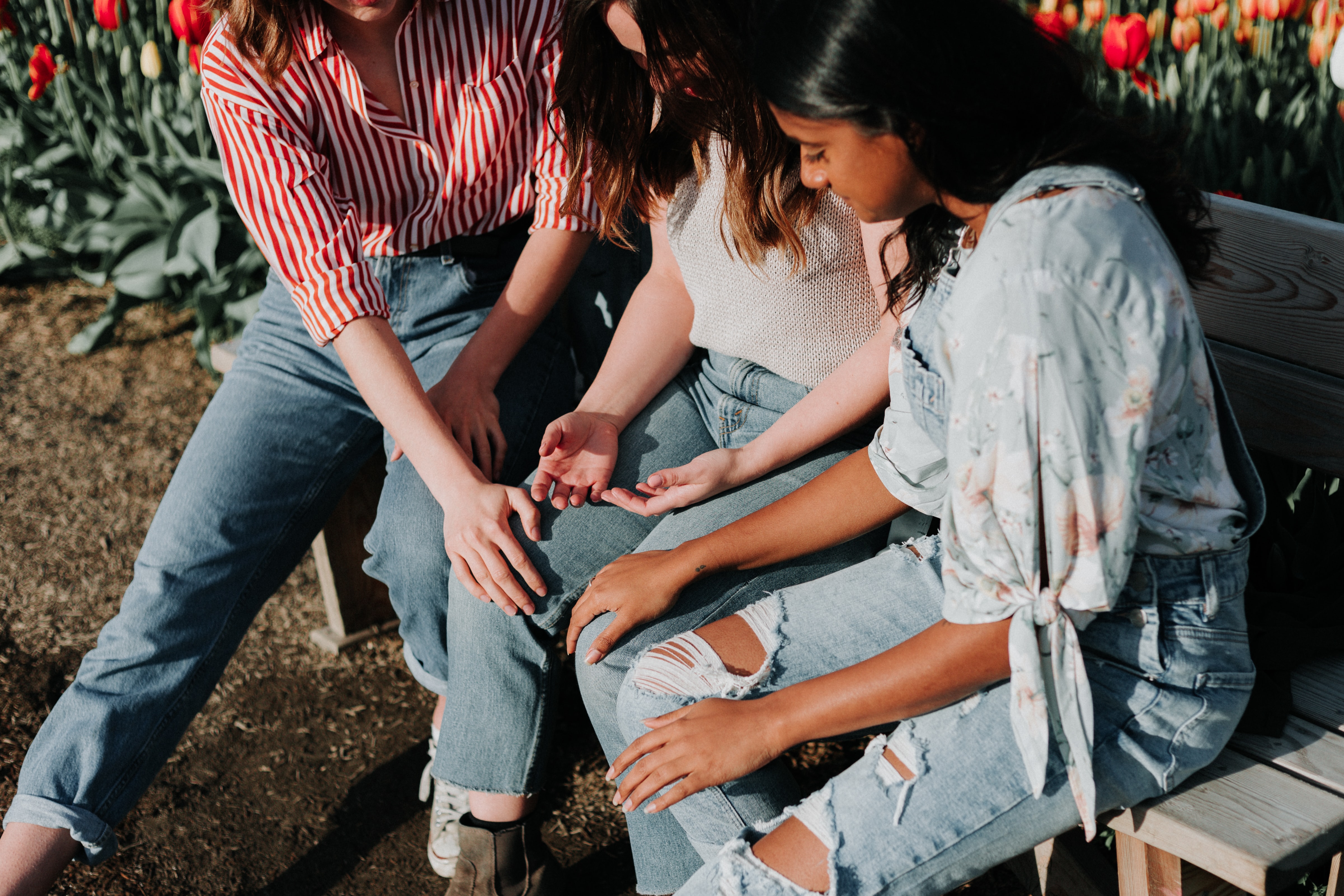 Girls praying together.