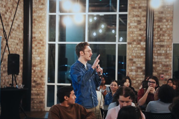 Student speaking at the Grid