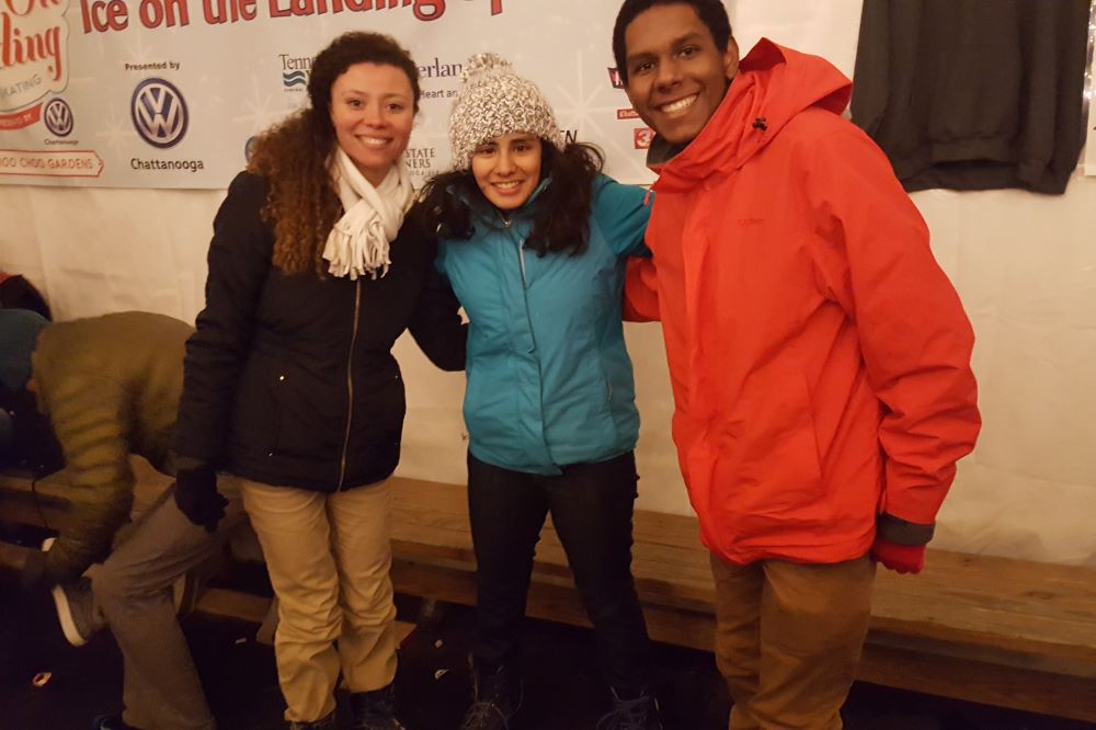 Three people posing for a photo