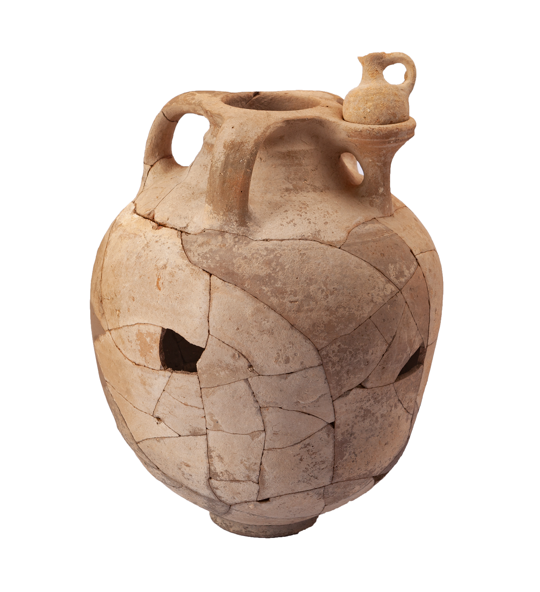 A reconstructed archaeologic artifact vessel with a small vessel placed on top of it.